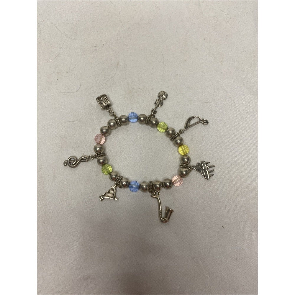 Vintage Charm Bracelet With Musical Instruments And Pastel Colored Beads